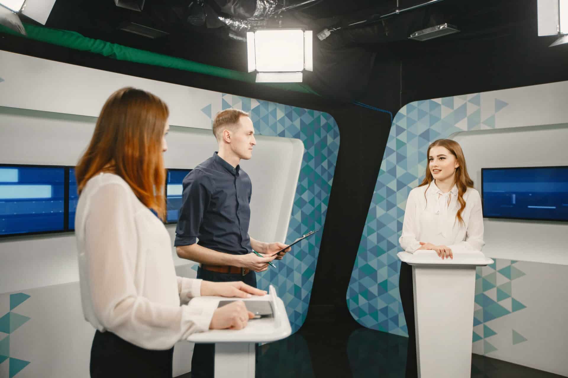 Tv host and two participants on game show